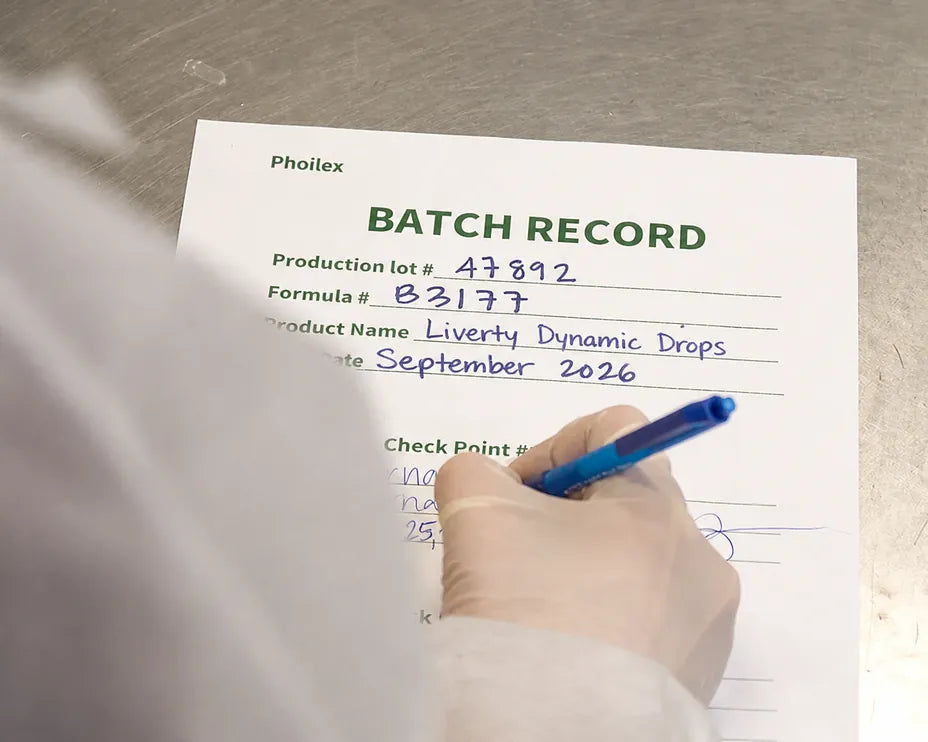 Batch record form with handwritten details for Phoilex Liverty Dynamic Drops